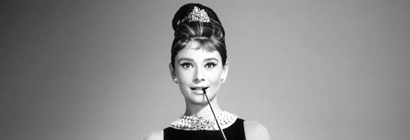 Idea Girl Media uses Audrey Hepburn modeling a little black dress as an example of blogging and audio as social media strategy and content marketing